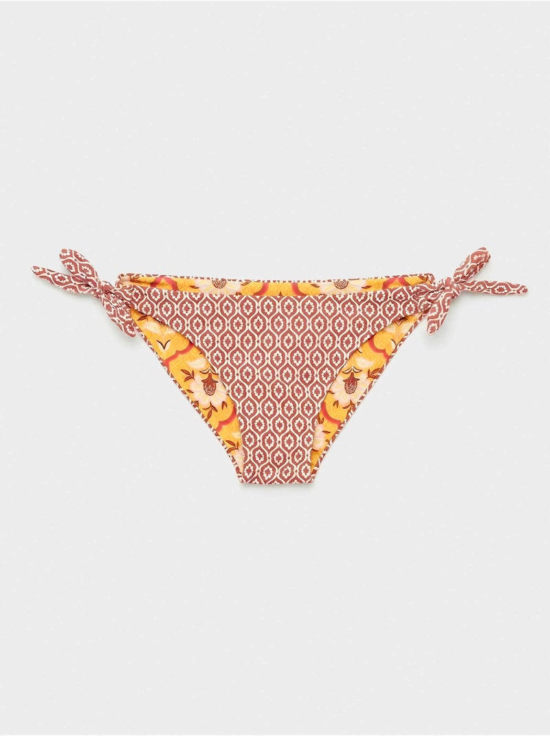 Slip bikini reversibile e regolabile Multicolore - Kiabi