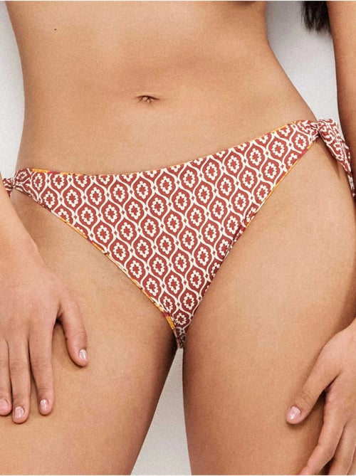 Slip bikini reversibile e regolabile - Kiabi Slip bikini reversibile e regolabile - Kiabi