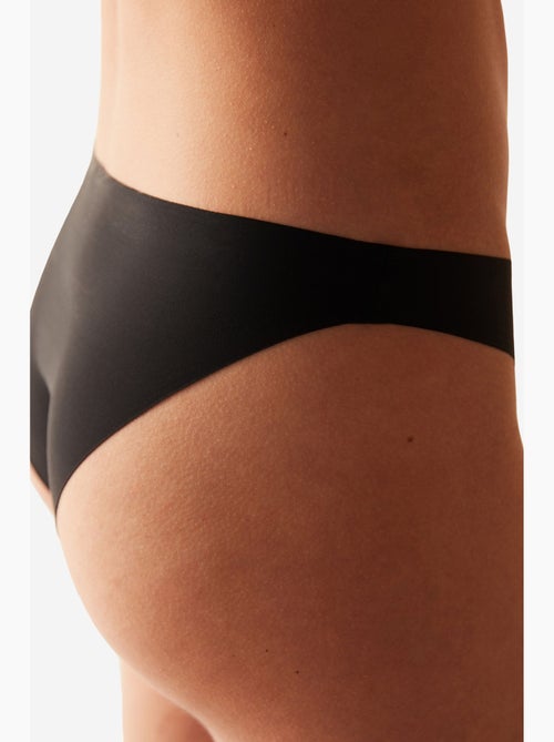Slip liscio senza cuciture a vita media con taglio laser penti - Kiabi Slip liscio senza cuciture a vita media con taglio laser penti - Kiabi