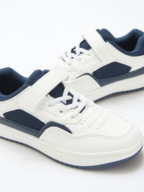 Sneaker basse con strappo a contrasto bicolore - Kiabi
