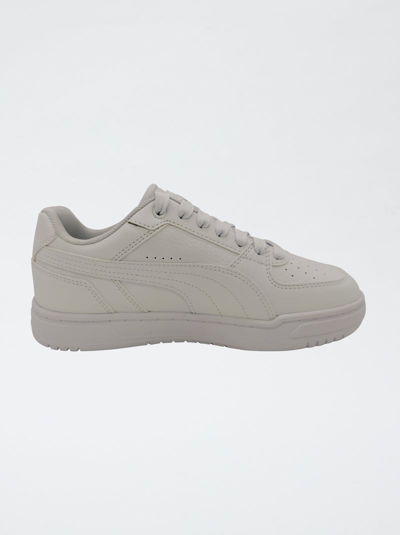 Sneaker tinta unita effetto pelle Bianco - Kiabi