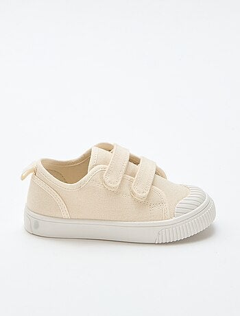 Sneakers basse in tela con strappi