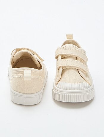 Sneakers basse in tela con strappi