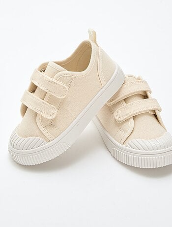 Sneakers basse in tela con strappi