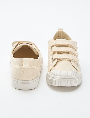 Sneakers basse in tela con strappi