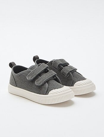 Sneakers basse in tela con strappi