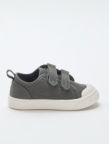 Sneakers basse in tela con strappi