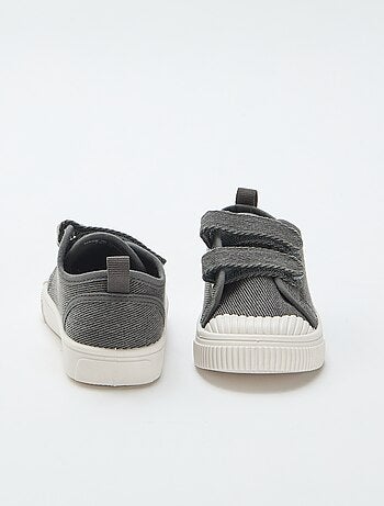 Sneakers basse in tela con strappi