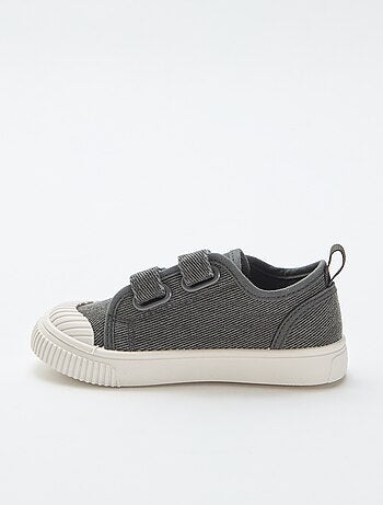 Sneakers basse in tela con strappi