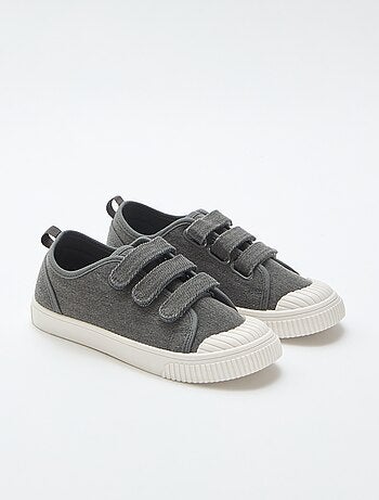 Sneakers basse in tela con strappi