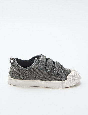 Sneakers basse in tela con strappi