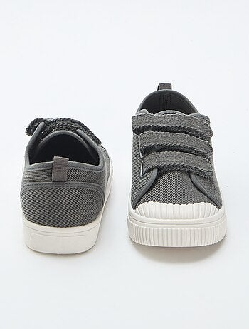 Sneakers basse in tela con strappi