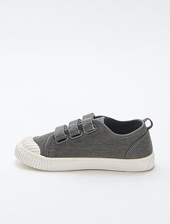 Sneakers basse in tela con strappi