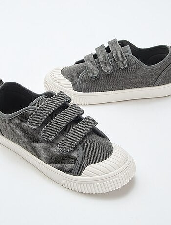 Sneakers basse in tela con strappi