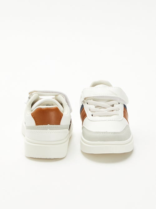 Sneakers bicolore con strappo - Kiabi