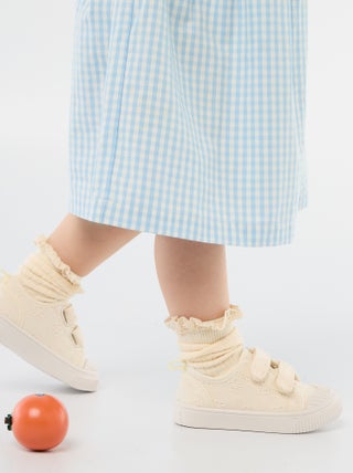 Sneakers in tela con stampa a scacchi