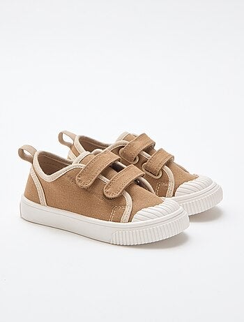 Sneakers in tela con strappi