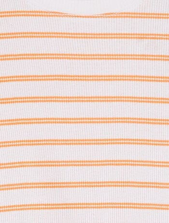 T-shirt a coste bordi ondulati e motivi