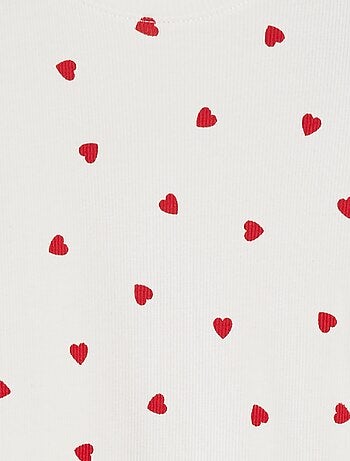 T-shirt a coste bordi ondulati e motivi