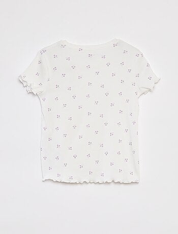 T-shirt a coste bordi ondulati e motivi