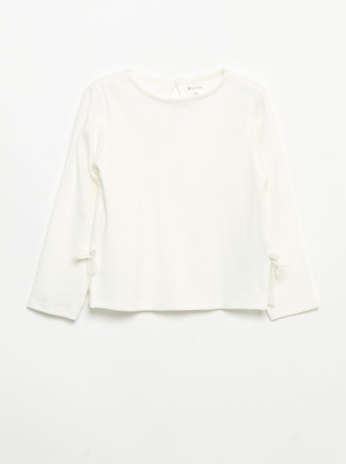 T-shirt a costine a maniche lunghe con fiocco - Kiabi T-shirt a costine a maniche lunghe con fiocco - Kiabi