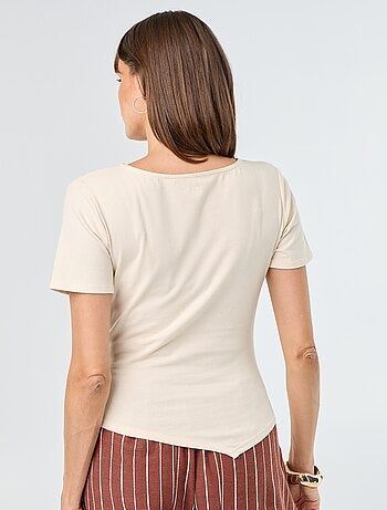 T-shirt a maniche corte asimmetrica