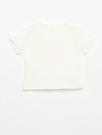 T-shirt a maniche corte con cuore cucito