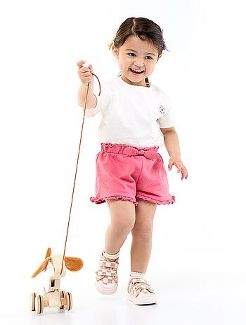 T-shirt a maniche corte con cuore cucito