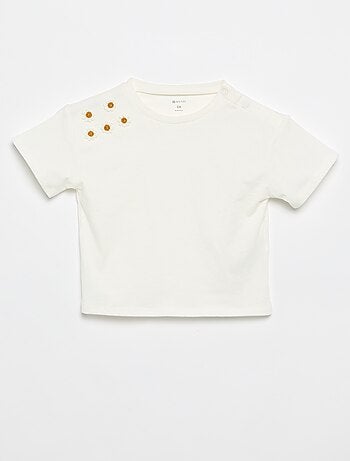 T-shirt a maniche corte con fiori sulla spalla