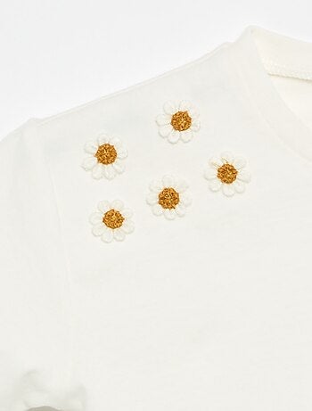 T-shirt a maniche corte con fiori sulla spalla