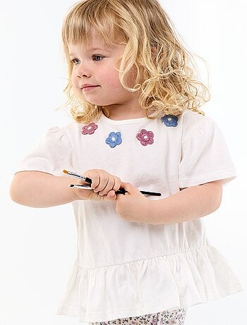 T-shirt a maniche corte con ricami e orlo a balze