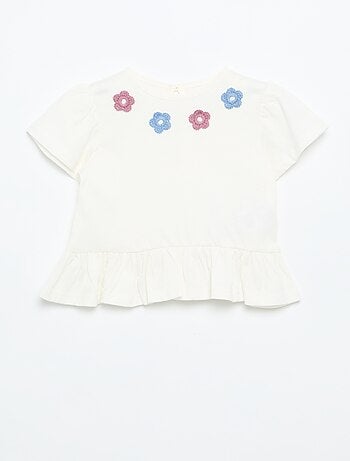 T-shirt a maniche corte con ricami e orlo a balze