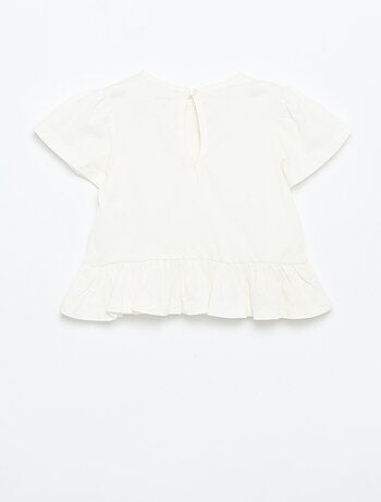 T-shirt a maniche corte con ricami e orlo a balze