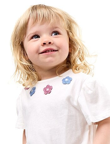 T-shirt a maniche corte con ricami e orlo a balze