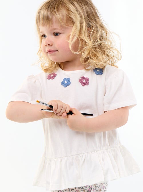 T-shirt a maniche corte con ricami e orlo a balze - Kiabi T-shirt a maniche corte con ricami e orlo a balze - Kiabi