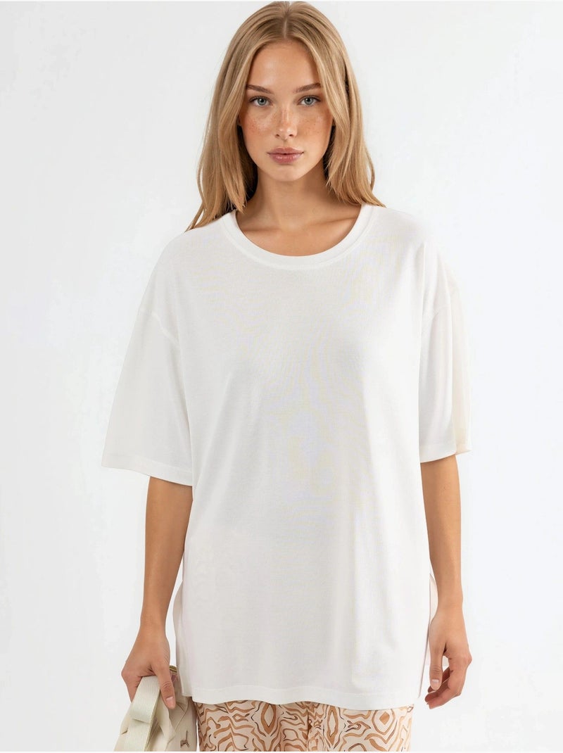 T-shirt a maniche corte con scollo rotondo e dettaglio con spacco busem Bianco - Kiabi