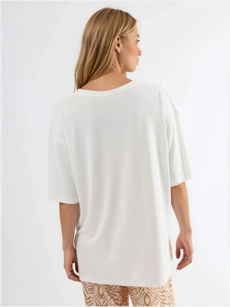 T-shirt a maniche corte con scollo rotondo e dettaglio con spacco busem Bianco - Kiabi