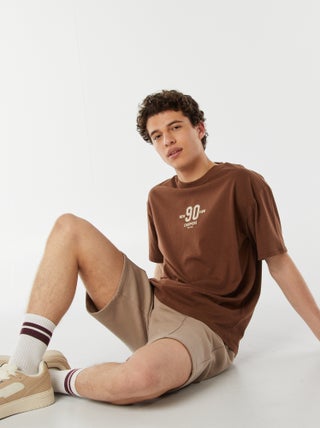 T-shirt a maniche corte con stampa 'New York' davanti e dietro