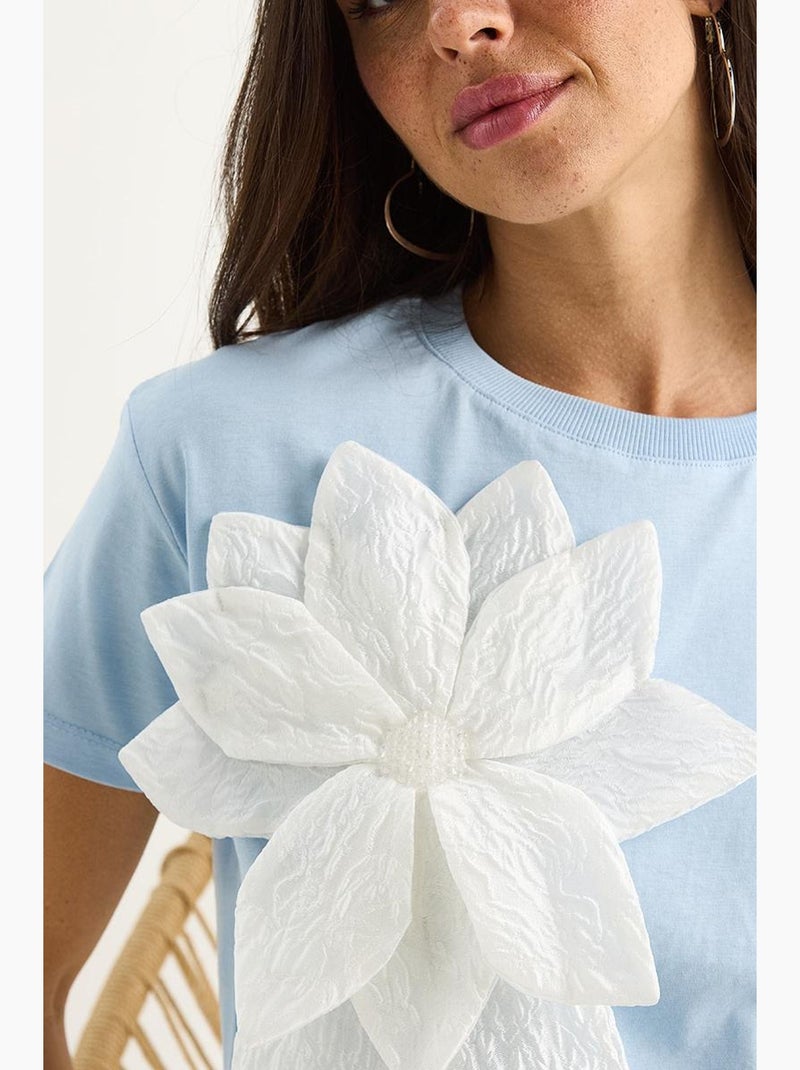 T-shirt a maniche corte in cotone con accessorio floreale lucci Blu cielo - Kiabi