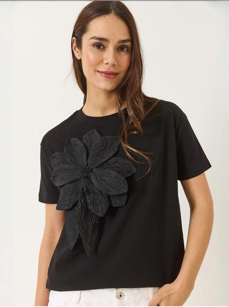 T-shirt a maniche corte in cotone con accessorio floreale lucci Nero - Kiabi
