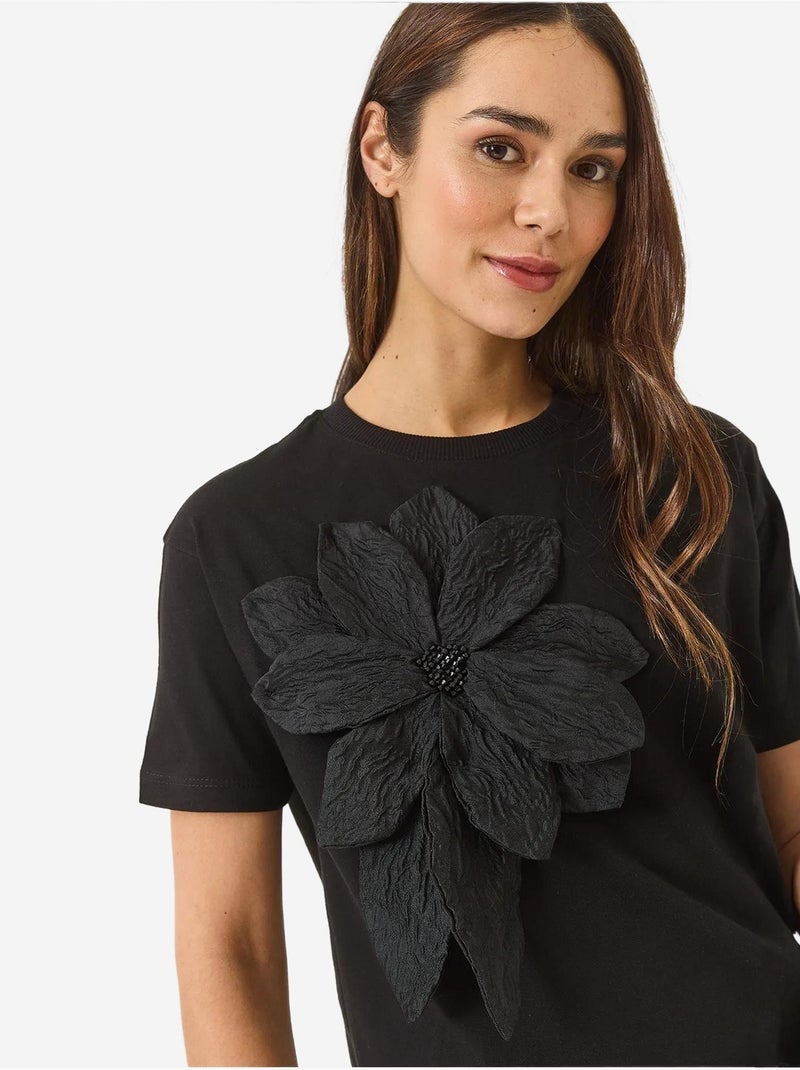 T-shirt a maniche corte in cotone con accessorio floreale lucci Nero - Kiabi