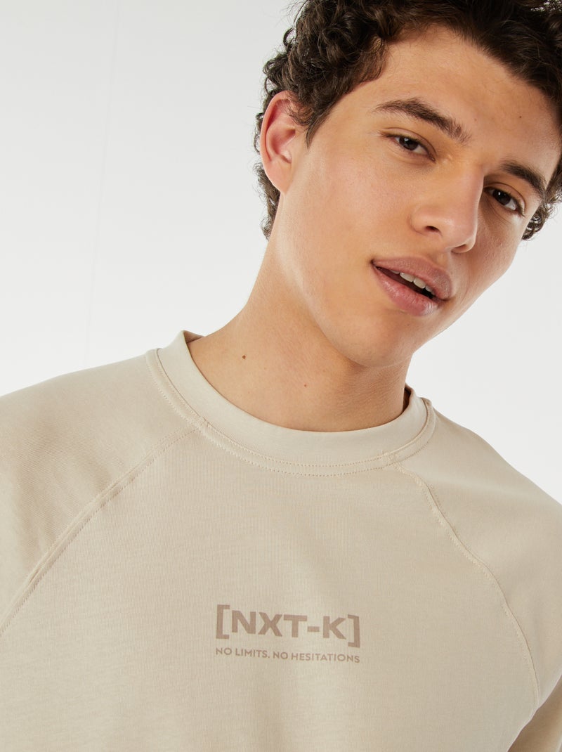 T-shirt a maniche corte raglan con stampa Beige - Kiabi