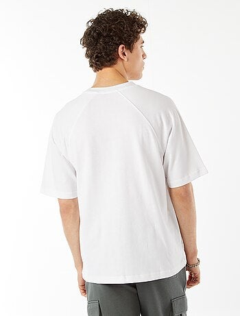 T-shirt a maniche corte raglan con stampa