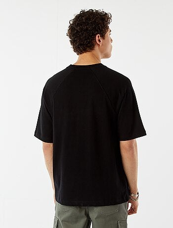 T-shirt a maniche corte raglan con stampa