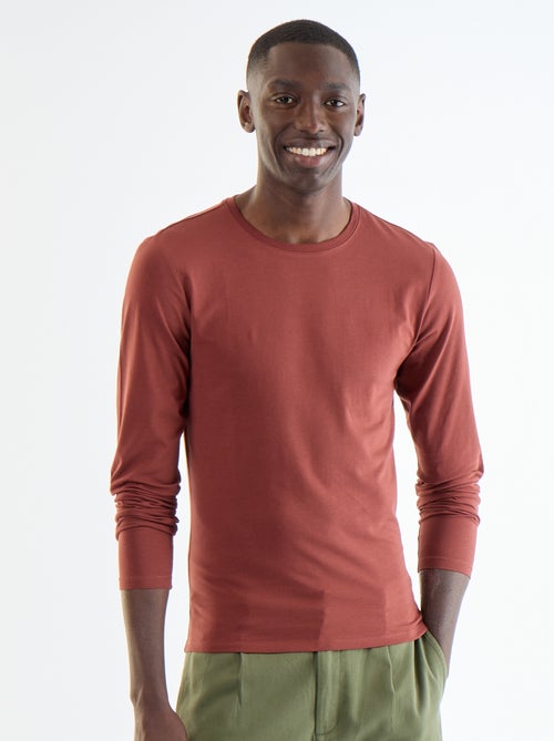 T-shirt a maniche lunghe a tinta unita - Kiabi T-shirt a maniche lunghe a tinta unita - Kiabi
