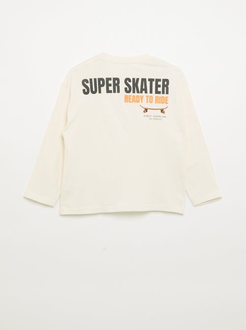 T-shirt a maniche lunghe con patch davanti e dietro - Kiabi T-shirt a maniche lunghe con patch davanti e dietro - Kiabi