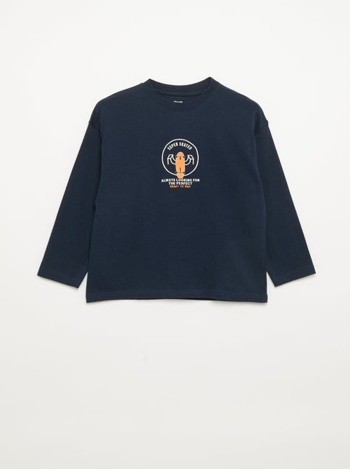 T-shirt a maniche lunghe con patch davanti e dietro - Kiabi T-shirt a maniche lunghe con patch davanti e dietro - Kiabi