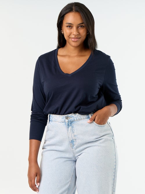 T-shirt a maniche lunghe con scollo a V - Kiabi T-shirt a maniche lunghe con scollo a V - Kiabi
