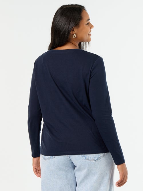 T-shirt a maniche lunghe con scollo a V - Kiabi T-shirt a maniche lunghe con scollo a V - Kiabi