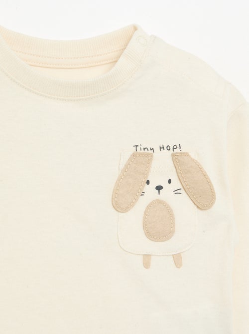 T-shirt a maniche lunghe con tasca animata - Kiabi T-shirt a maniche lunghe con tasca animata - Kiabi